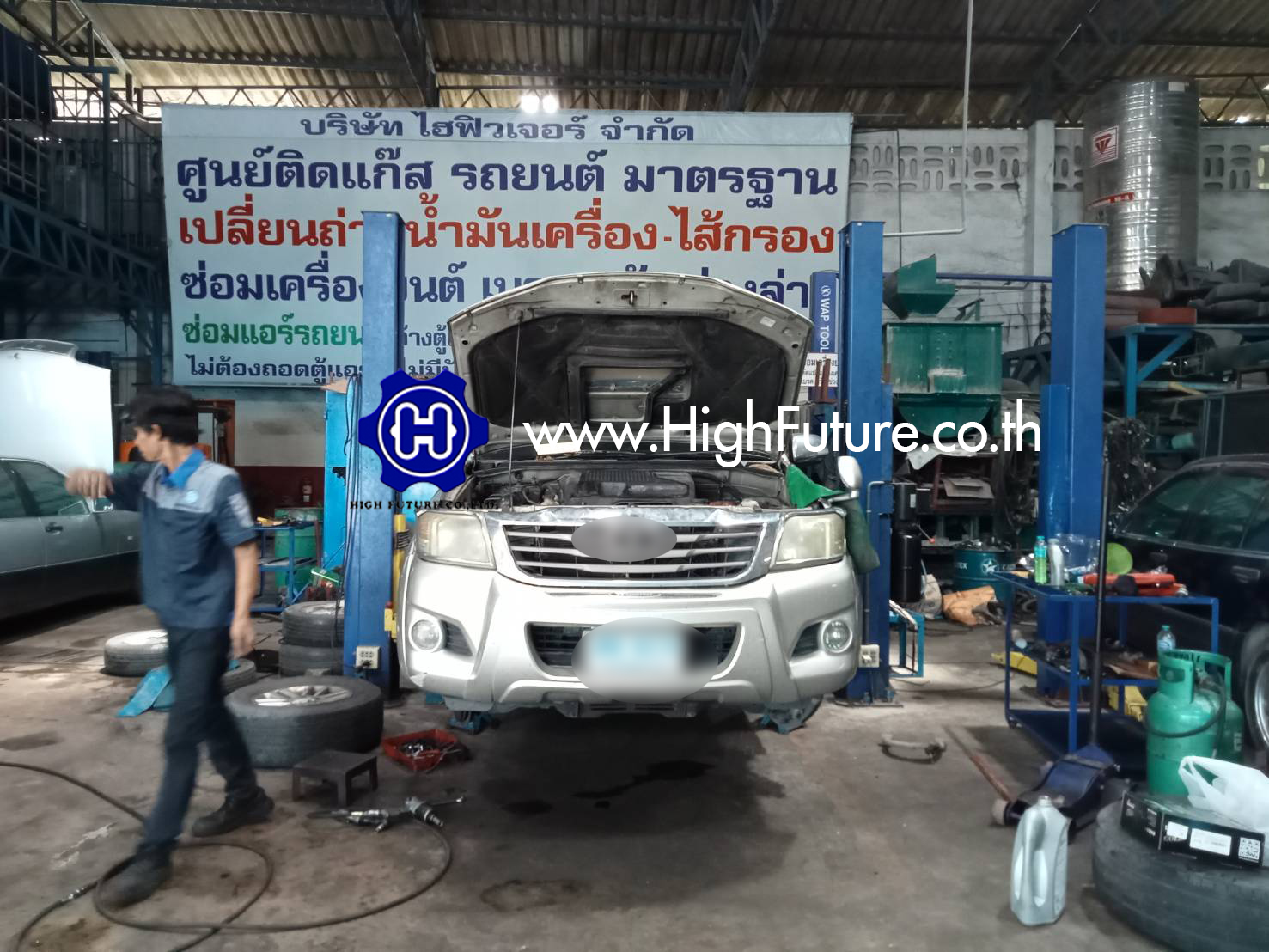 TOYOTA VIGO เปลี่ยนถ่ายน้ำมันเครื่อง 4 - High Future บริษัท ไฮฟิวเจอร์ จำกัด ศูนย์ติดตั้งแก๊สรถยนต์มาตรฐาน ซ่อมรถยนต์ ช่วงล่าง เบรค คลัทช์
